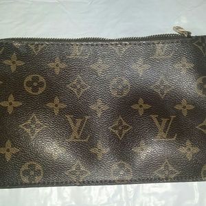 Pouch - off brand louis vuitton  not authenic